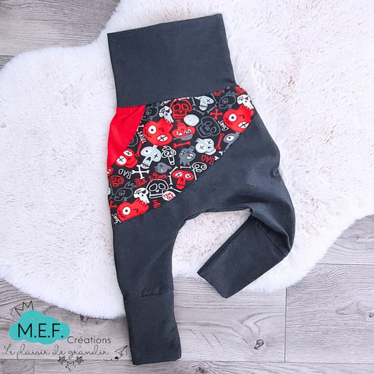 Pantalon évolutif têtes de mort rouges variés