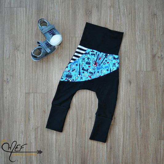 pantalon évolutif asymétrique motif guitare et uni noir pour enfant