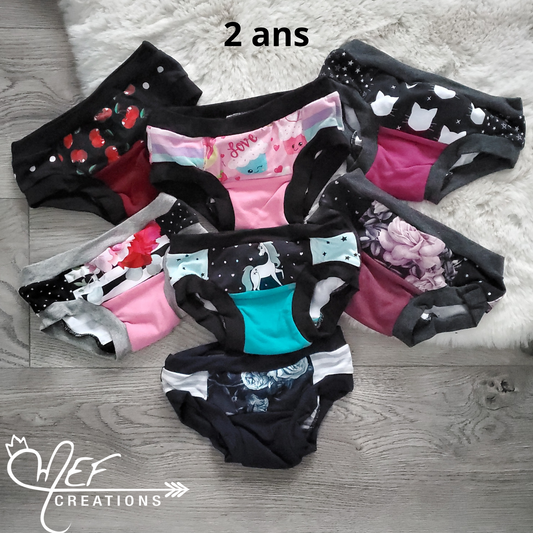 Culottes fille 2 ans, lot de 7, prêt-à-partir , cerise, cupcake, chat, fleuris rayé, licorne, fleuris mauve, fleuris marine